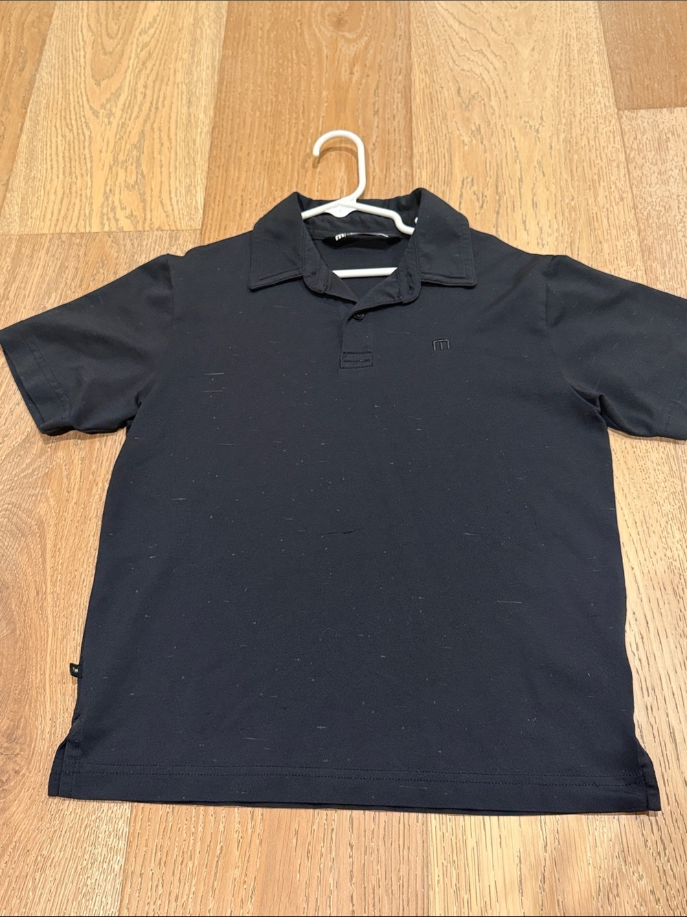 Bus Travis Mathew Black Polo Shirt - Classic Short Sleeve